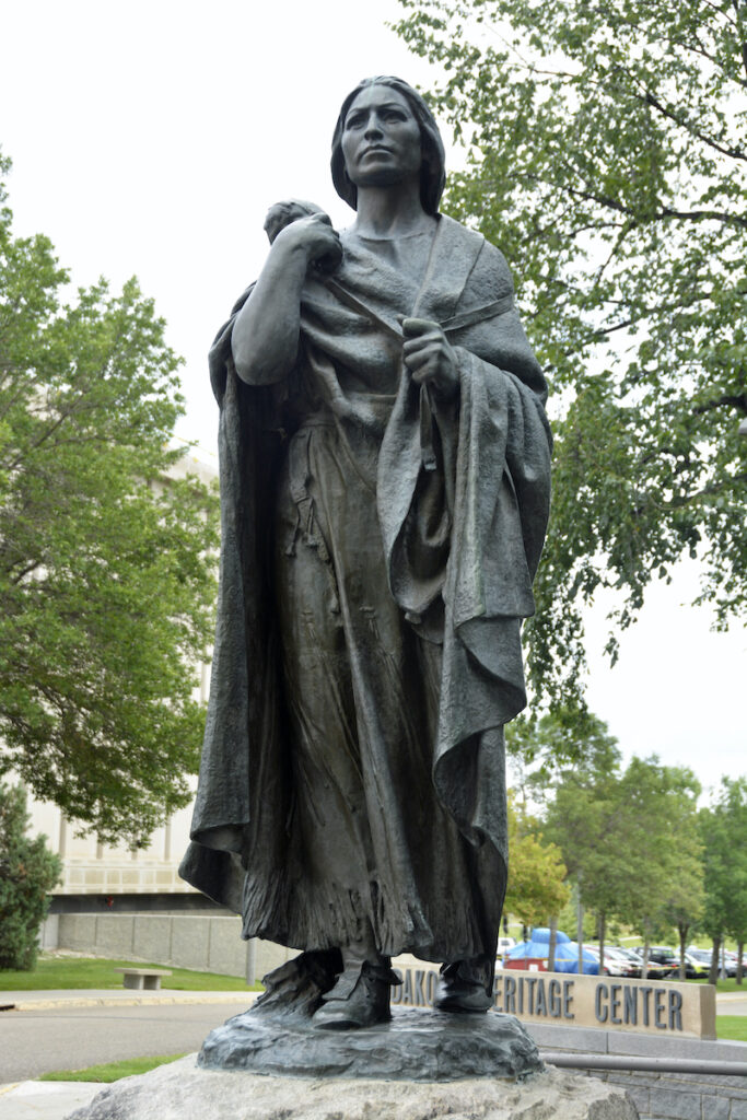 Leonard Crunelle's superb statue of Sacagawea and her child Jean Baptiste on the capitol grounds in Bismarck, North Dakota. 1909.