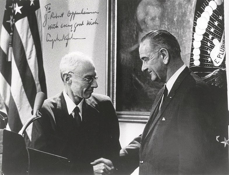 Robert Oppenheimer receiving Enrico Fermi award from President Lyndon Johnson, December 2, 1963. U.S. Dept. of Energy.