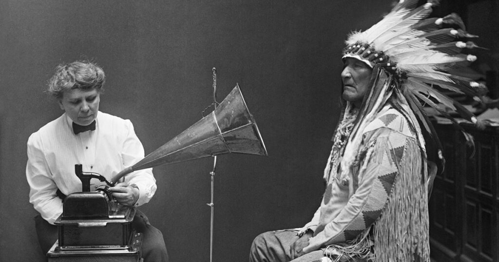 Frances Densmore recording a Native American on the northern plains, ca. 1912.