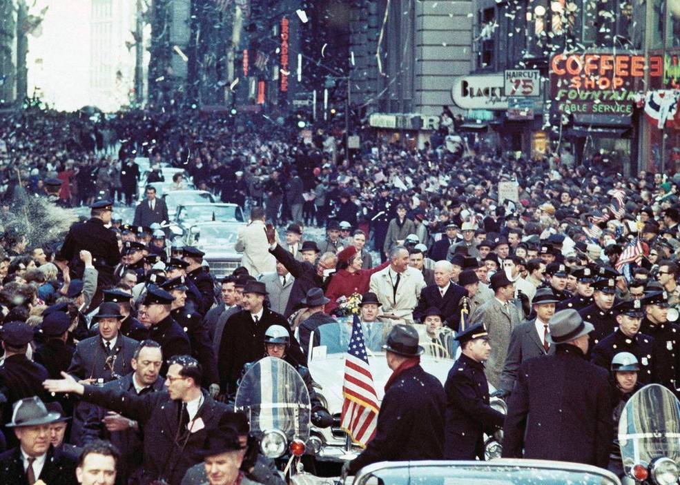 Astronaut John H. Glenn, his wife Annie and Vice President Johnson, during ticker tape parade attended by some four million people in New York City.