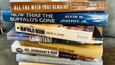 stack of books on American buffalo