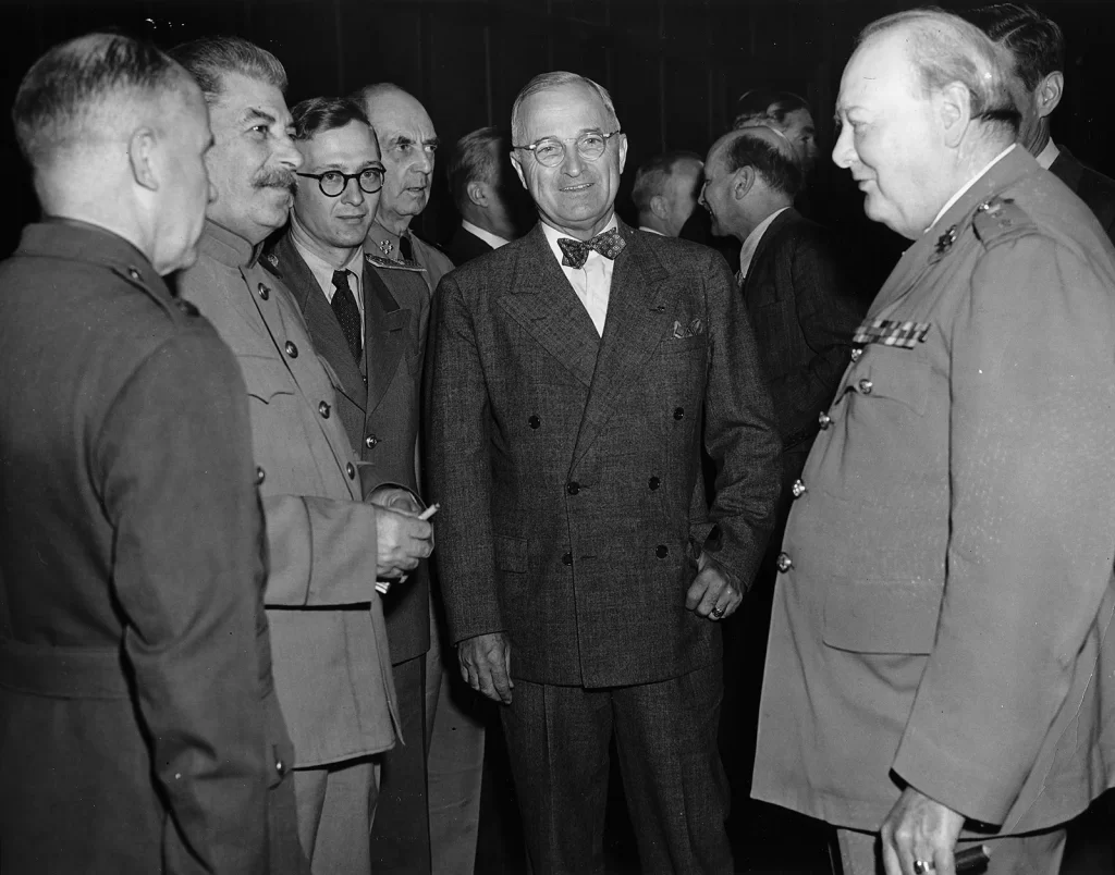 Potsdam Conference. U.S. President Harry S. Truman (centre), flanked by Soviet Premier Joseph Stalin and British Prime Minister Winston Churchill,July 1945.( Photo - U.S. Army)
