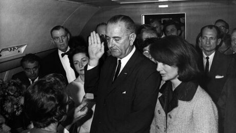 Lyndon B. Johnson takes the oath of office aboard Air Force One, 22 November 1963. (White House photo)