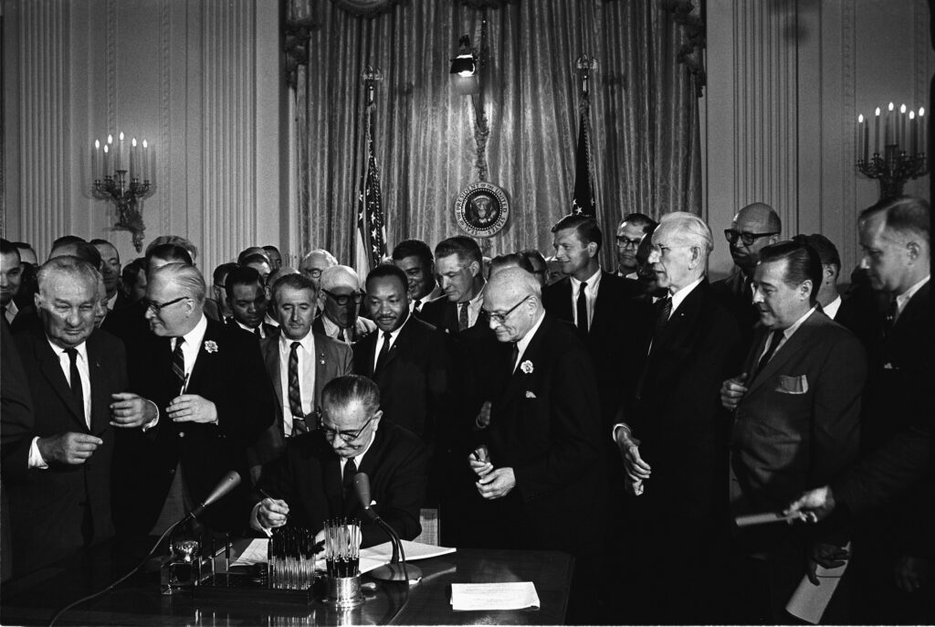 President Lyndon B. Johnson signing the 1964 Civil Rights Act, July 2, 1964. (White House Photo)