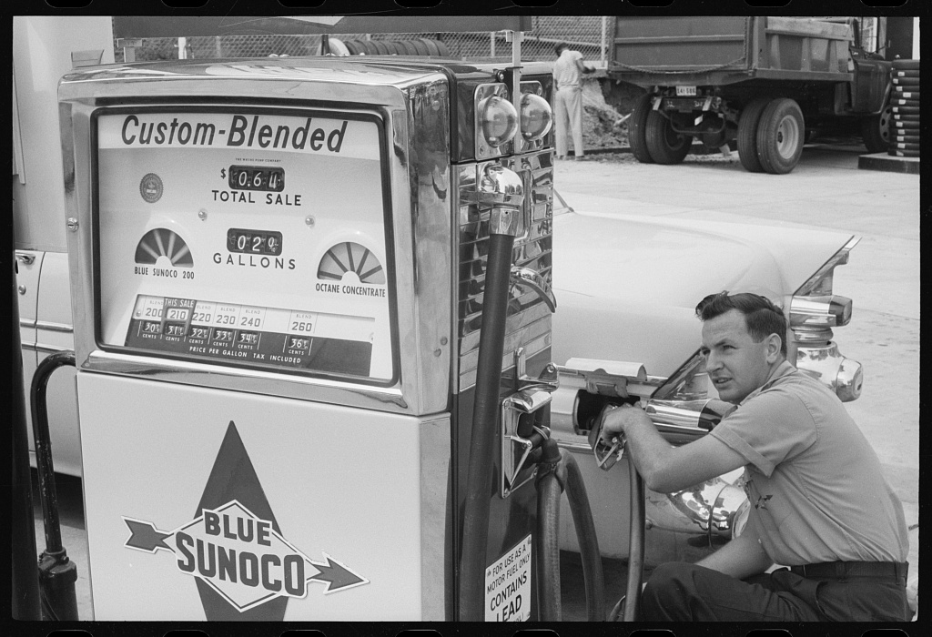 "Filler up!" Gas station attendant, 1958. (Photo LOC)