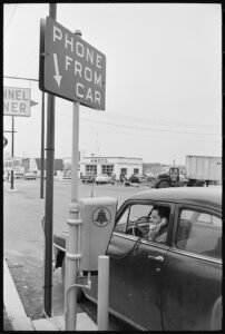 Before the mobile phone. A driver stops at a drive-in telephone on Route 40 bear Baltimore in 1959. (Photo LOC)