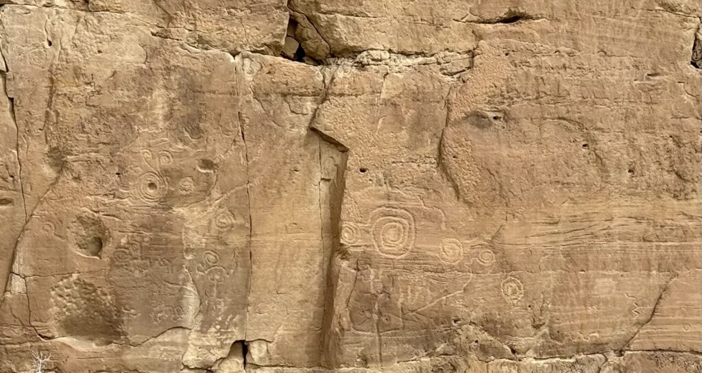 Ancient petroglyphs carved into canyon walls at Chaco. (Photo by Dennis McKenna)