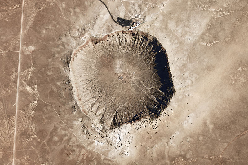 A NASA Earth Observatory image of Meteor Crater, 4000 feet across and 700 feet deep, in Arizona.