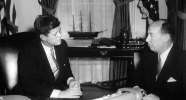 President Kennedy and Adlai Stevenson in the Oval Office.