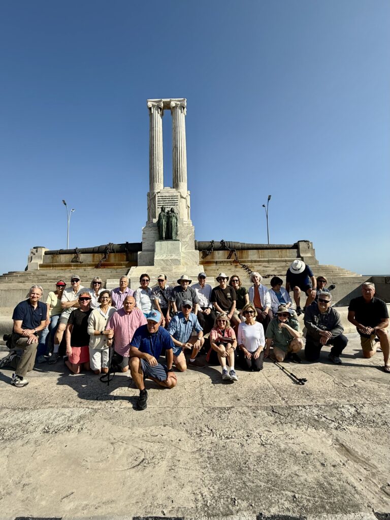 Clay and his guests at the memorial to the USS Maine in Havana, Cuba.