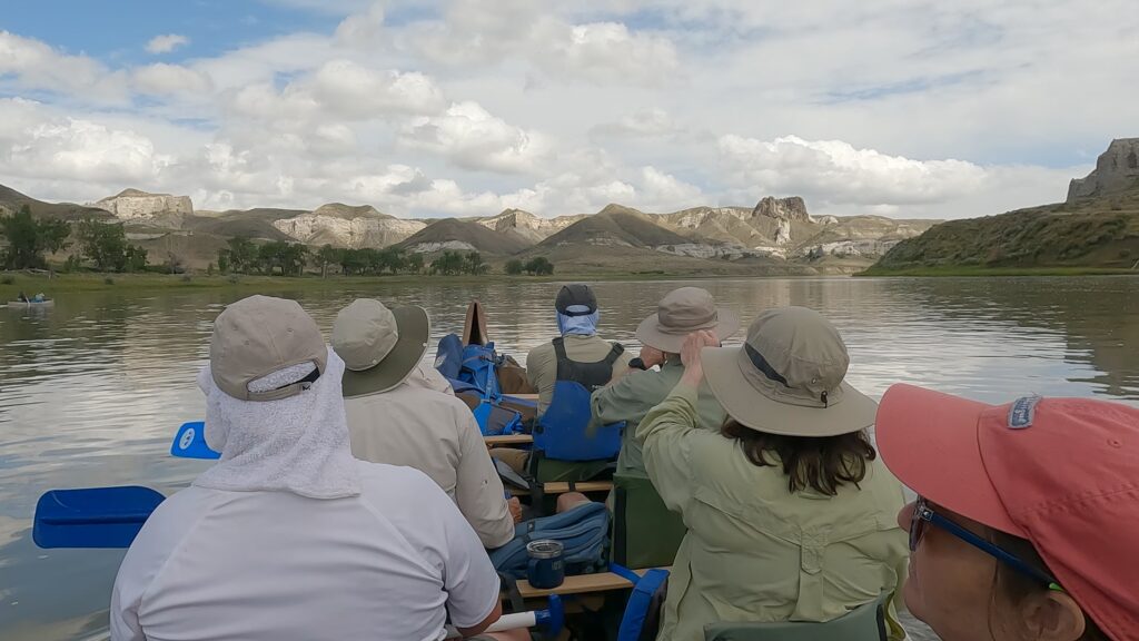 Tour paddle toward the White Cliffs of the Missouri River southeast of Fort Benton, Montana.