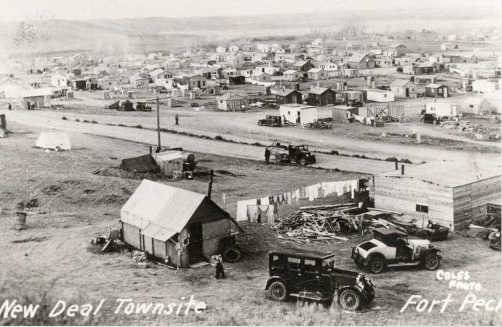 Near the Fort Peck Dam construction site in eastern Montana, circa 1937. The Fort Peck Dam is the highest of six major dams along the Missouri River. Dam construction workers and their families developed the townsite to provide temporary housing (Montana Historical Society)