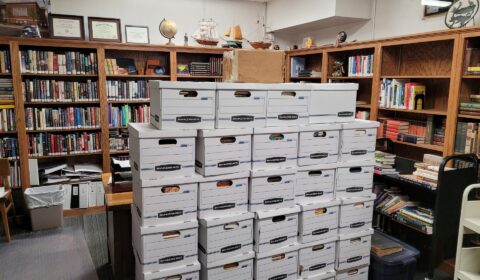 About 40 boxes of books culled from Clay’s massive personal library sit ready to be taken to their new home.