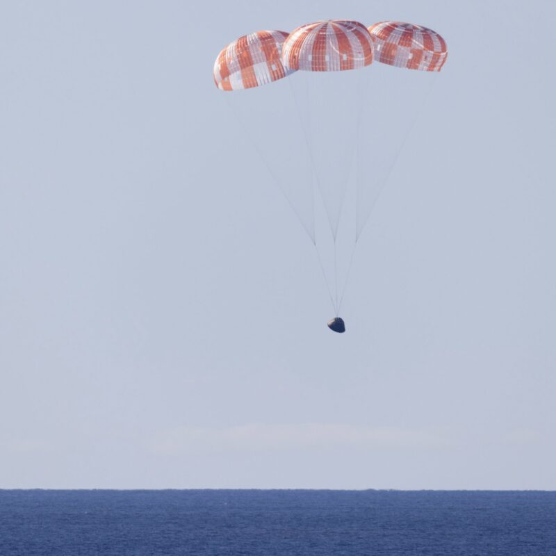 Artemis II Recovery NASA’s Orion spacecraft under parachutes as it lands in the Pacific Ocean off the coast of California, Friday, April 10, 2026.