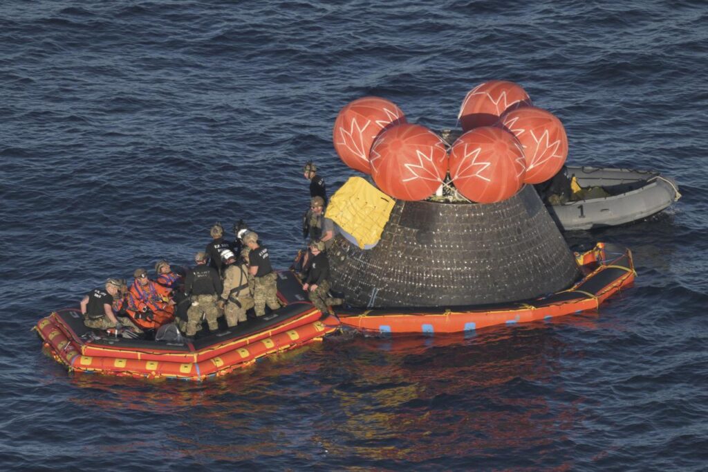 Artemis II recovered from Orion spacecraft and loaded onto an inflatable raft, called the front porch.