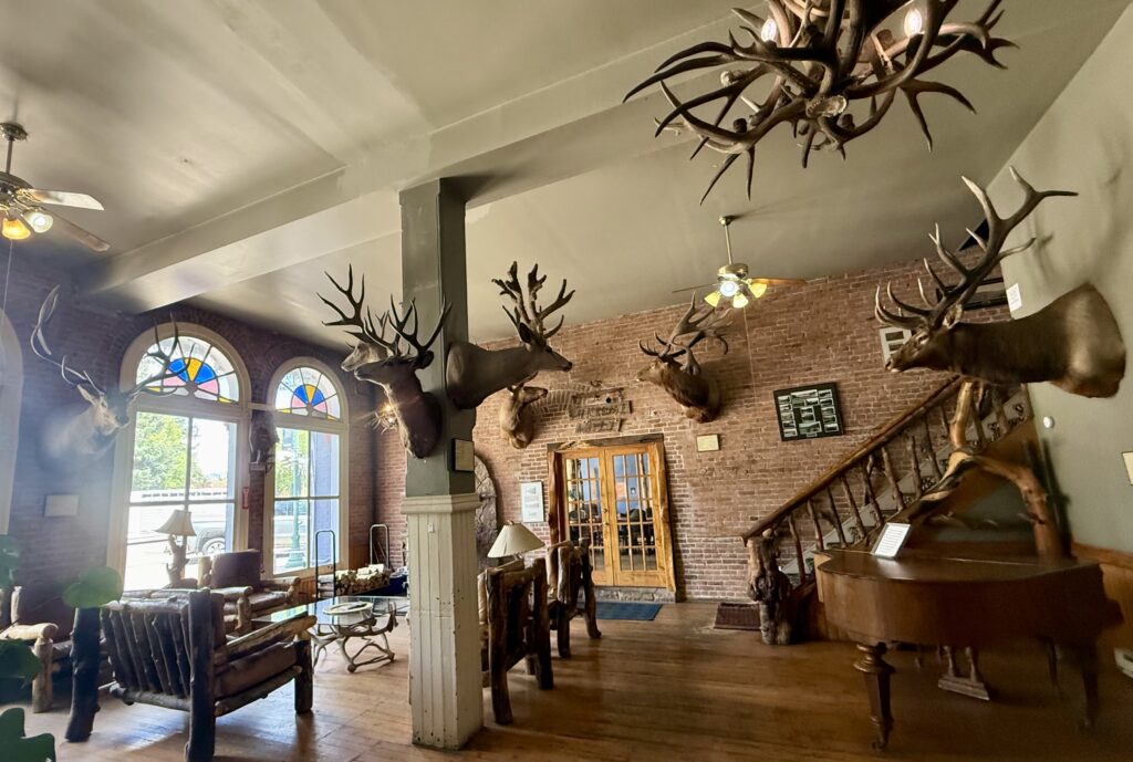 The lobby of the historic Meeker Hotel, where Teddy Roosevelt stayed while hunting mountain lions in the region in the early 1900s.