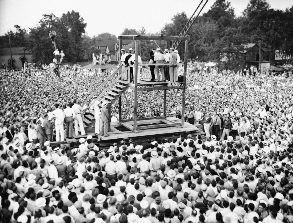 The 1936 public execution of a 22-year-old Black man, Bethea, convicted of the rape and robbery of a 70-year-old white woman. An estimated 10,000 to 20,000 spectators gathered around the wooden scaffold in a public courtyard. Widespread public disorder and criticism surrounding the spectacle led Kentucky (and other states) to ban public executions, making Bethea's hanging widely recognized as the last officially sanctioned public execution in the United States.