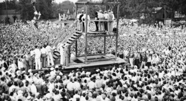 The 1936 public execution of a 22-year-old Black man, Bethea, convicted of the rape and robbery of a 70-year-old white woman. An estimated 10,000 to 20,000 spectators gathered around the wooden scaffold in a public courtyard. Widespread public disorder and criticism surrounding the spectacle led Kentucky (and other states) to ban public executions, making Bethea's hanging widely recognized as the last officially sanctioned public execution in the United States.